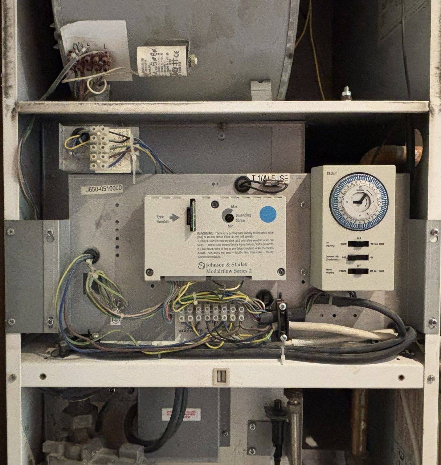 Warm air heater control panel and wiring during fault diagnosis