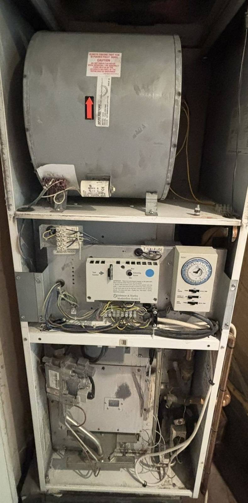 Johnson & Starley warm air heating unit opened up for servicing